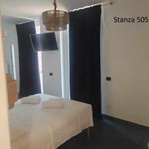 Camera Quadrupla Deluxe con letto matrimoniale