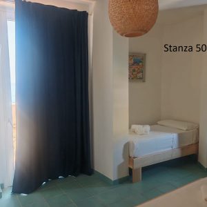 Camera Tripla Deluxe con letto singolo e accesso al balcone vista mare