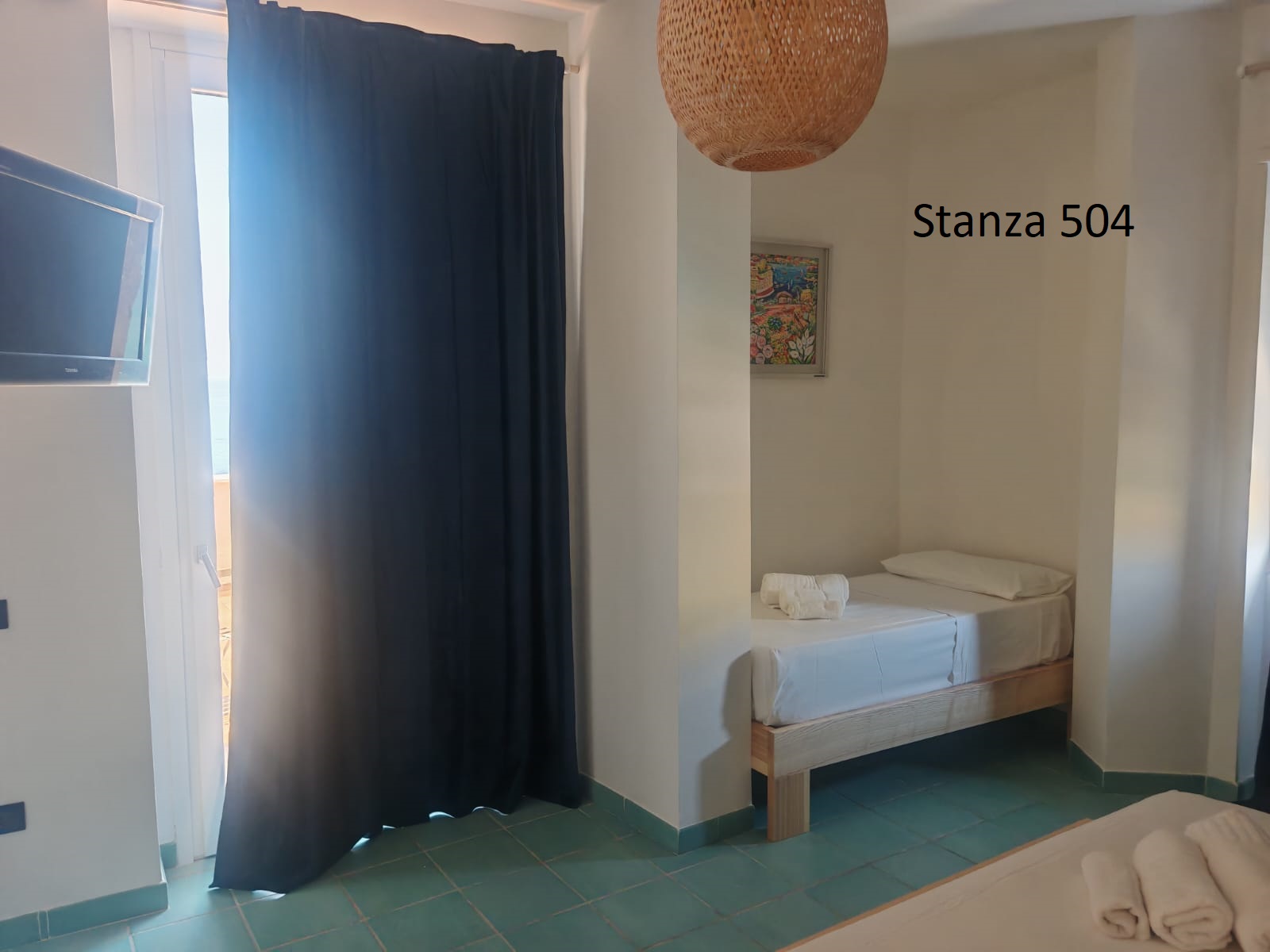 Camera Tripla Deluxe con letto singolo e accesso al balcone vista mare
